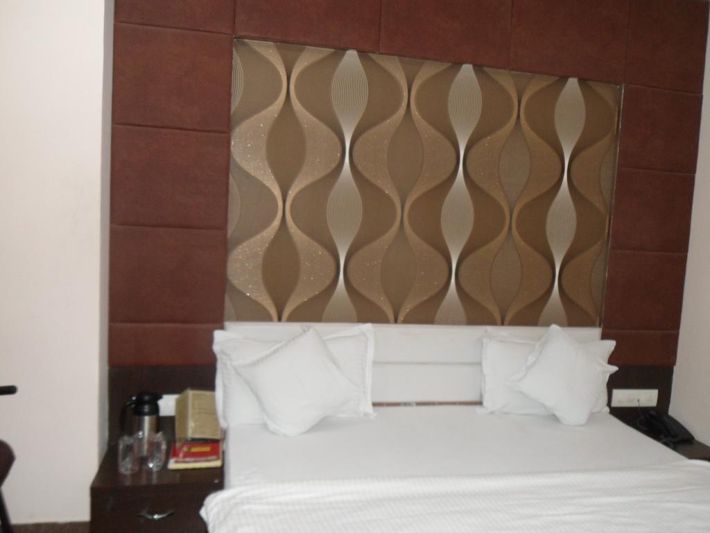 Hotel Silver Plaza Ahmadábád Pokoj fotografie